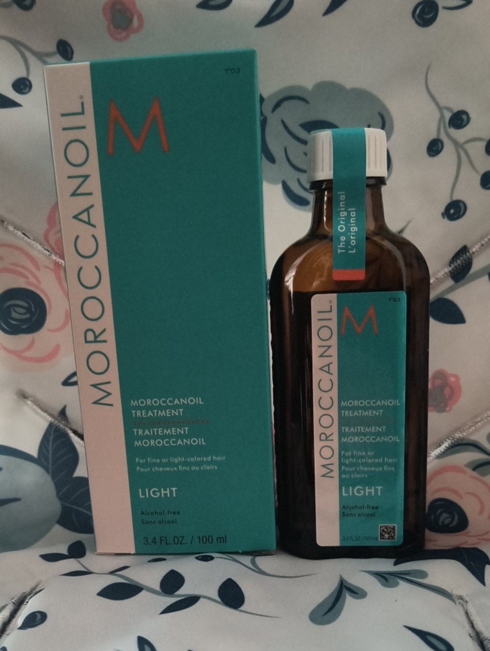 Moroccanoil Light Treatment - Turquoise & White Bottle and Box